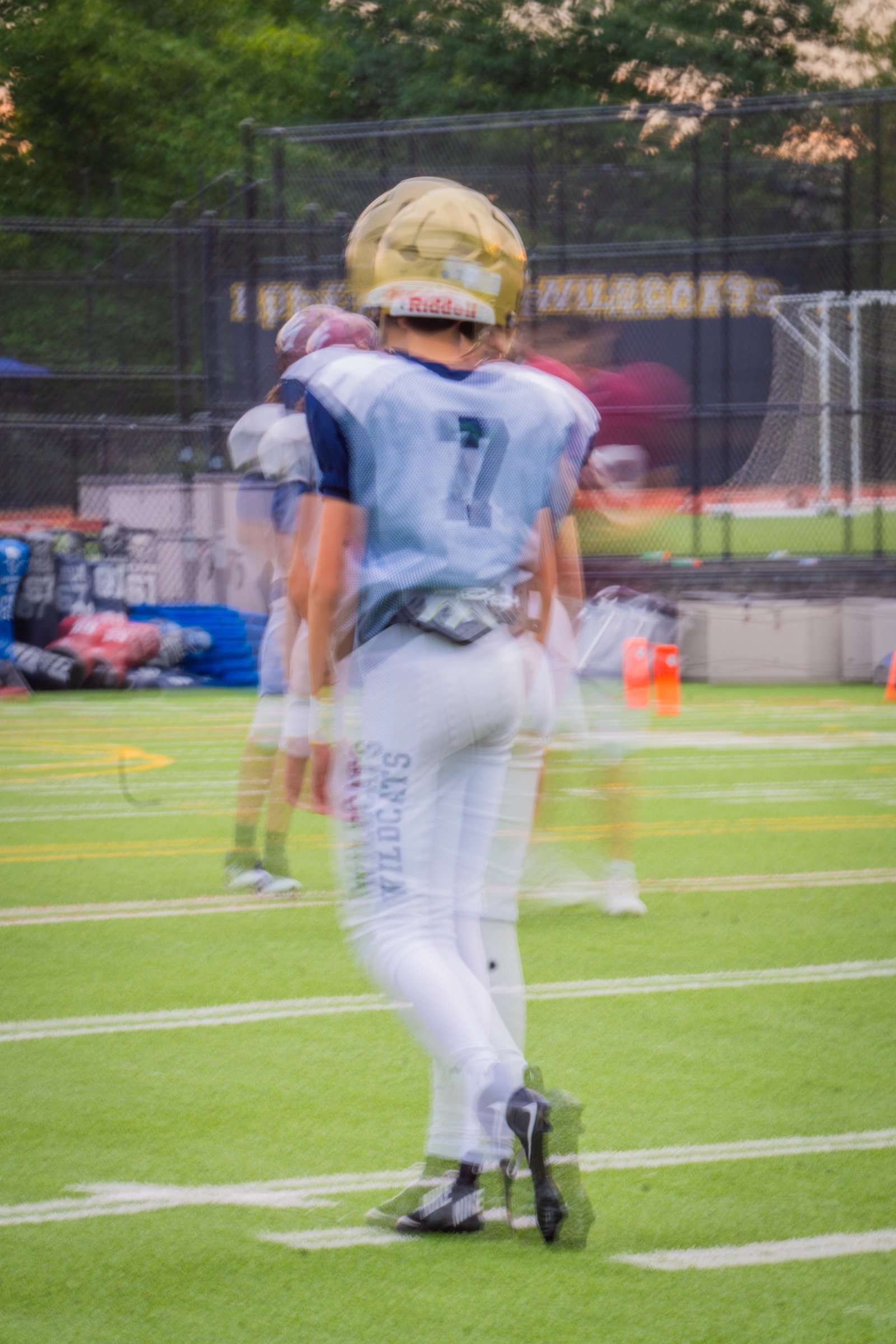 Experimental multiple exposure of a football player walking